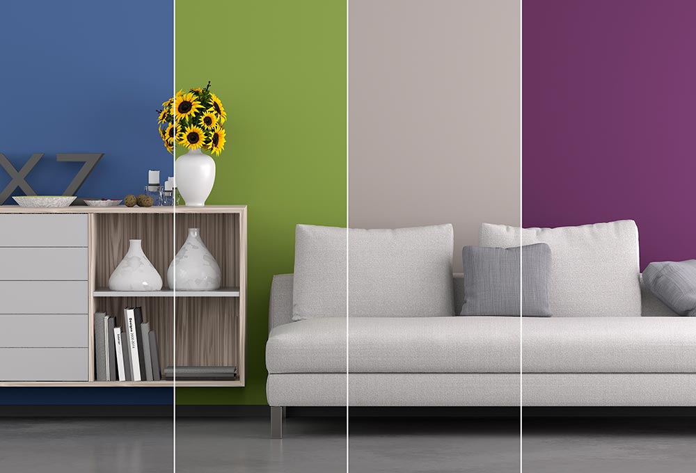 A white couch with white and gray pillows, next to a white buffet cabinet, split into four different sections, showing a blue wall, green wall, gray wall and purple wall.