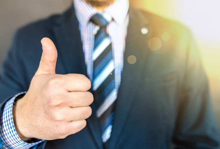 A man holding his hand in a 